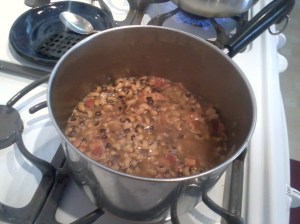 Peas simmering--Note the bacon!