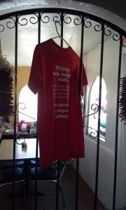 It explains they wear red on Fridays to honor the troops.